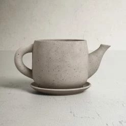 Freeda Concrete Outdoor Statue Planter